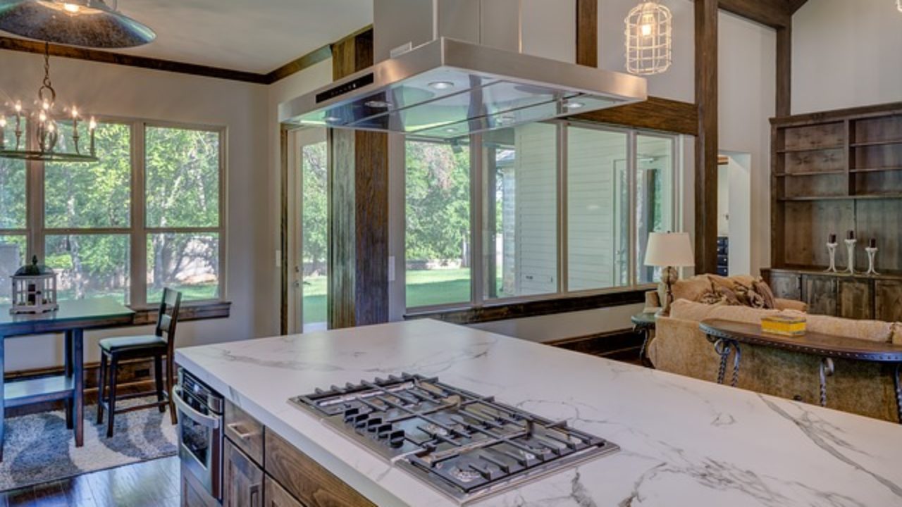 Kitchen island with 2025 cooktop and seating